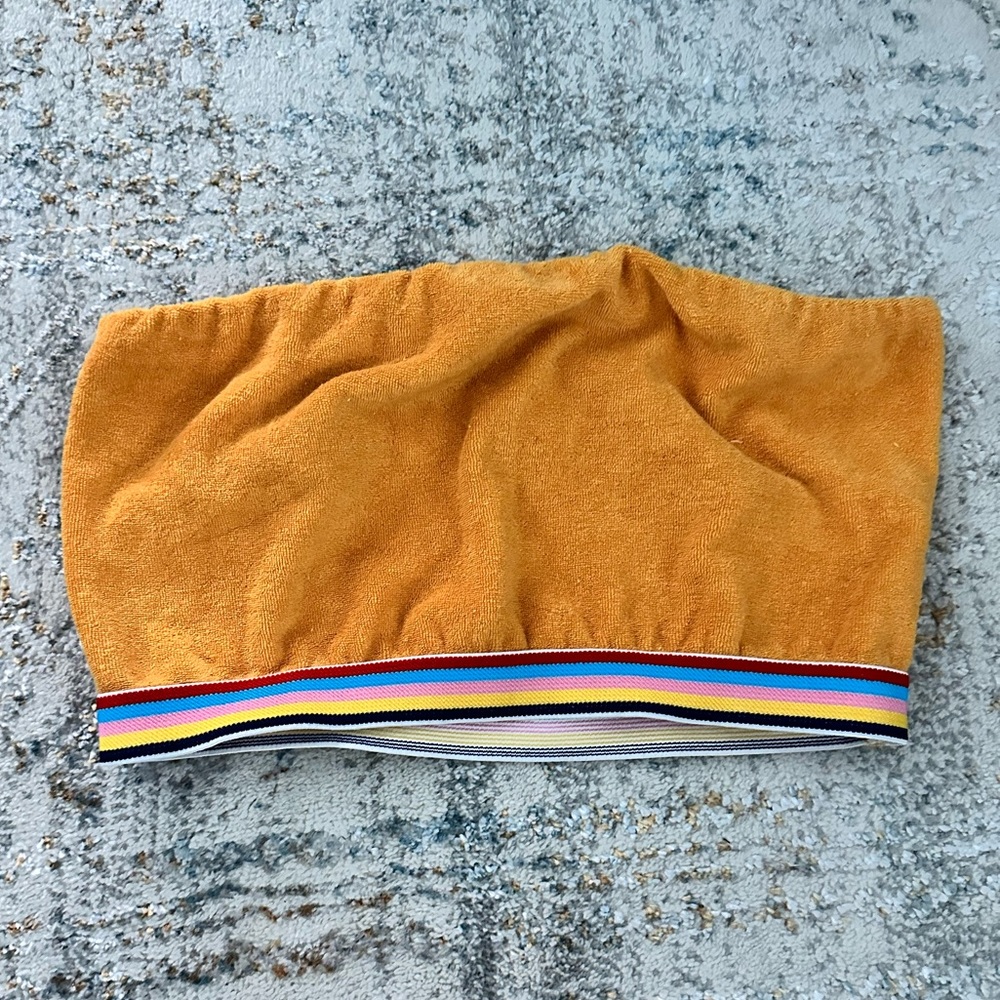 Cute and soft yellow crop top with a striped band